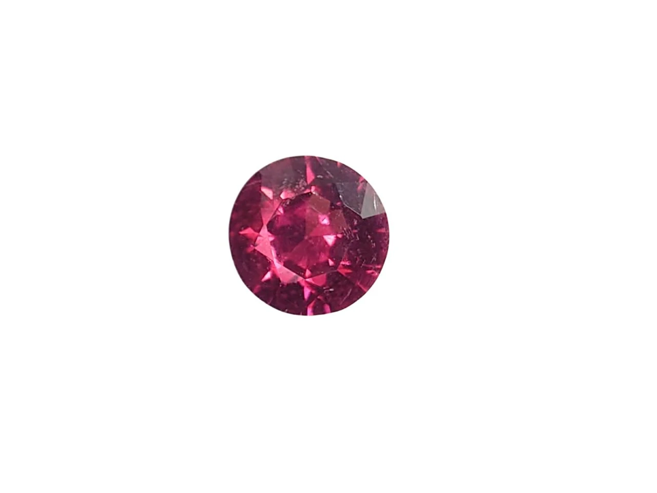 0.89ct natural Malaya Garnet Round Cut From — view 1